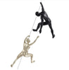 Climbing Couple Wall Sculpture